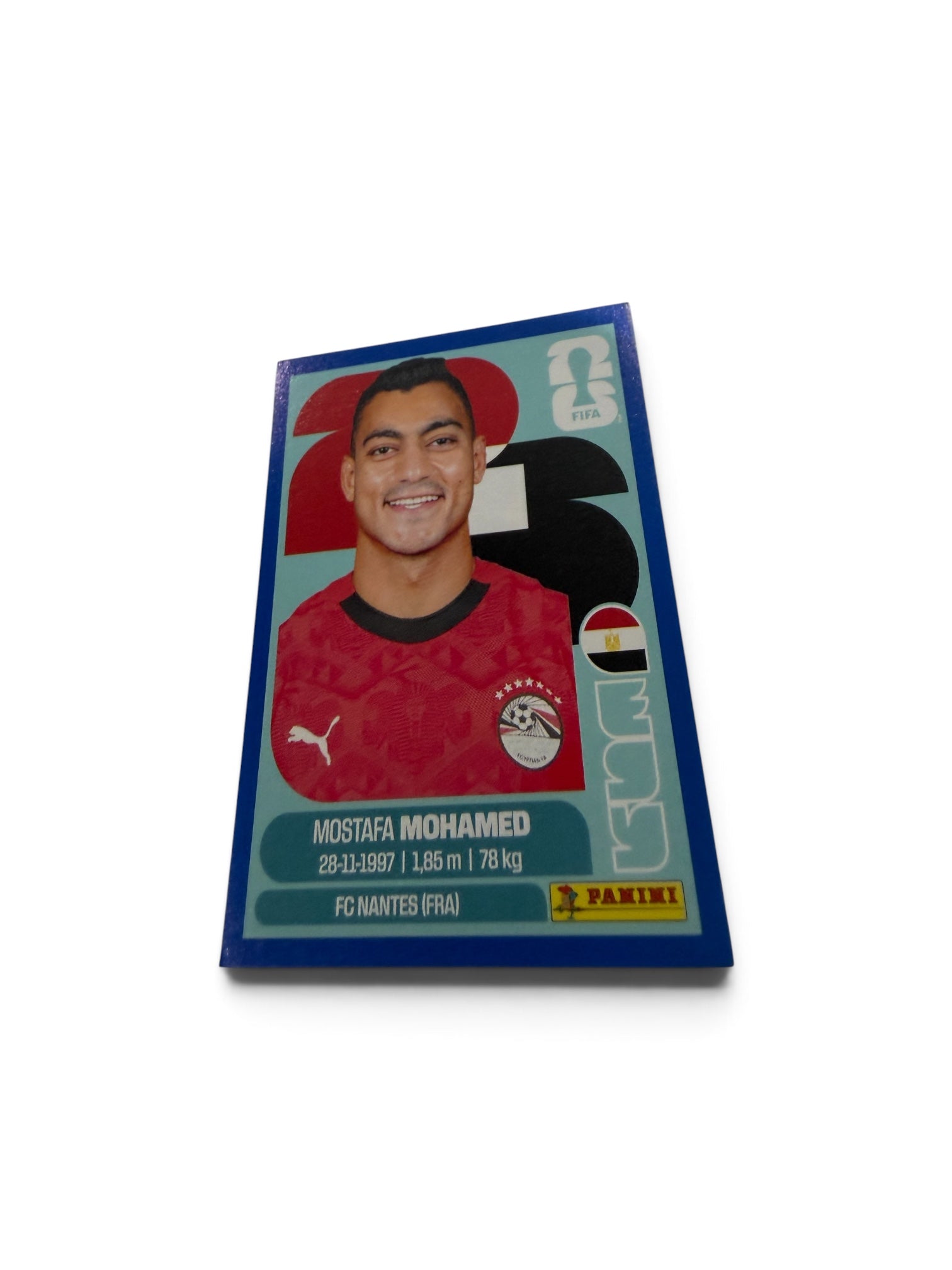 2026 Panini FIFA World Cup Blue Border Sticker – Mostafa Mohamed #EGY 18 – Egypt National Team – Limited Parallel