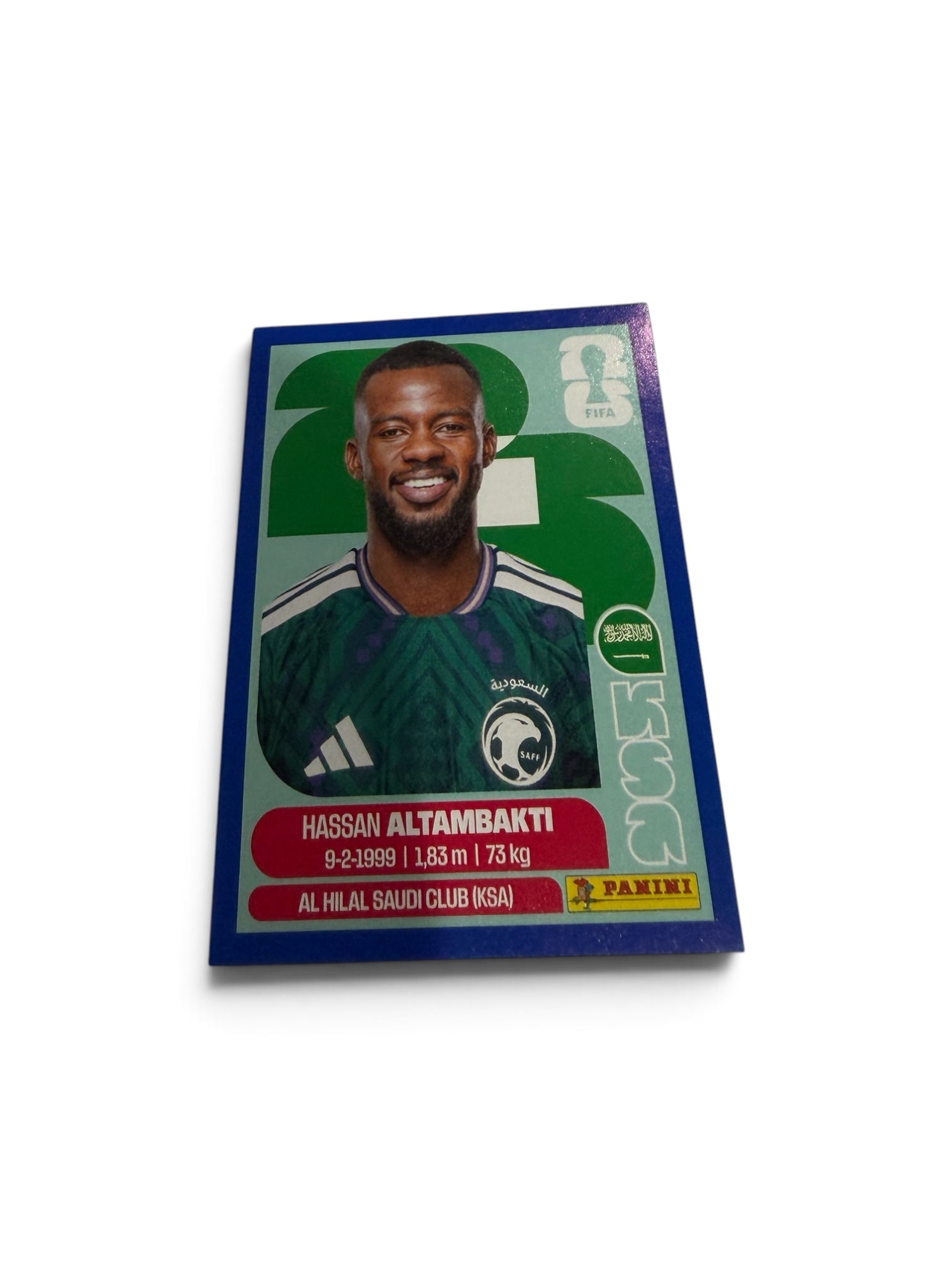 Hassan Al Tambakti Blue Border #KSA8 | Saudi Arabia | Panini FIFA World Cup 2026 Parallel Sticker | Al Hilal Saudi Club