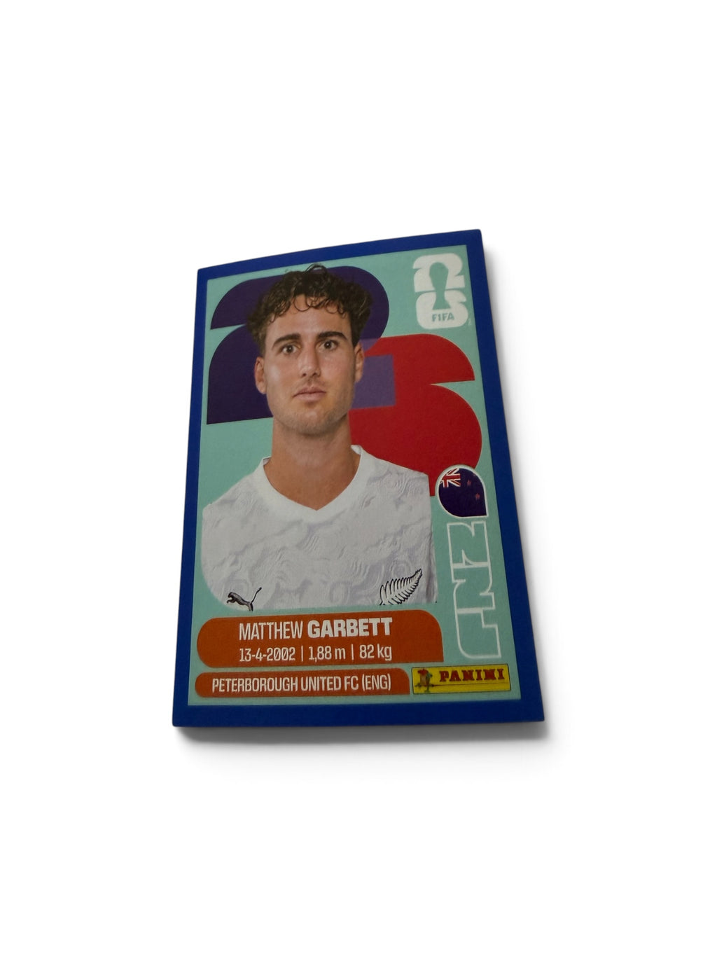 2026 Panini FIFA World Cup Blue Parallel Sticker #NZL14 Matthew Garbett – New Zealand